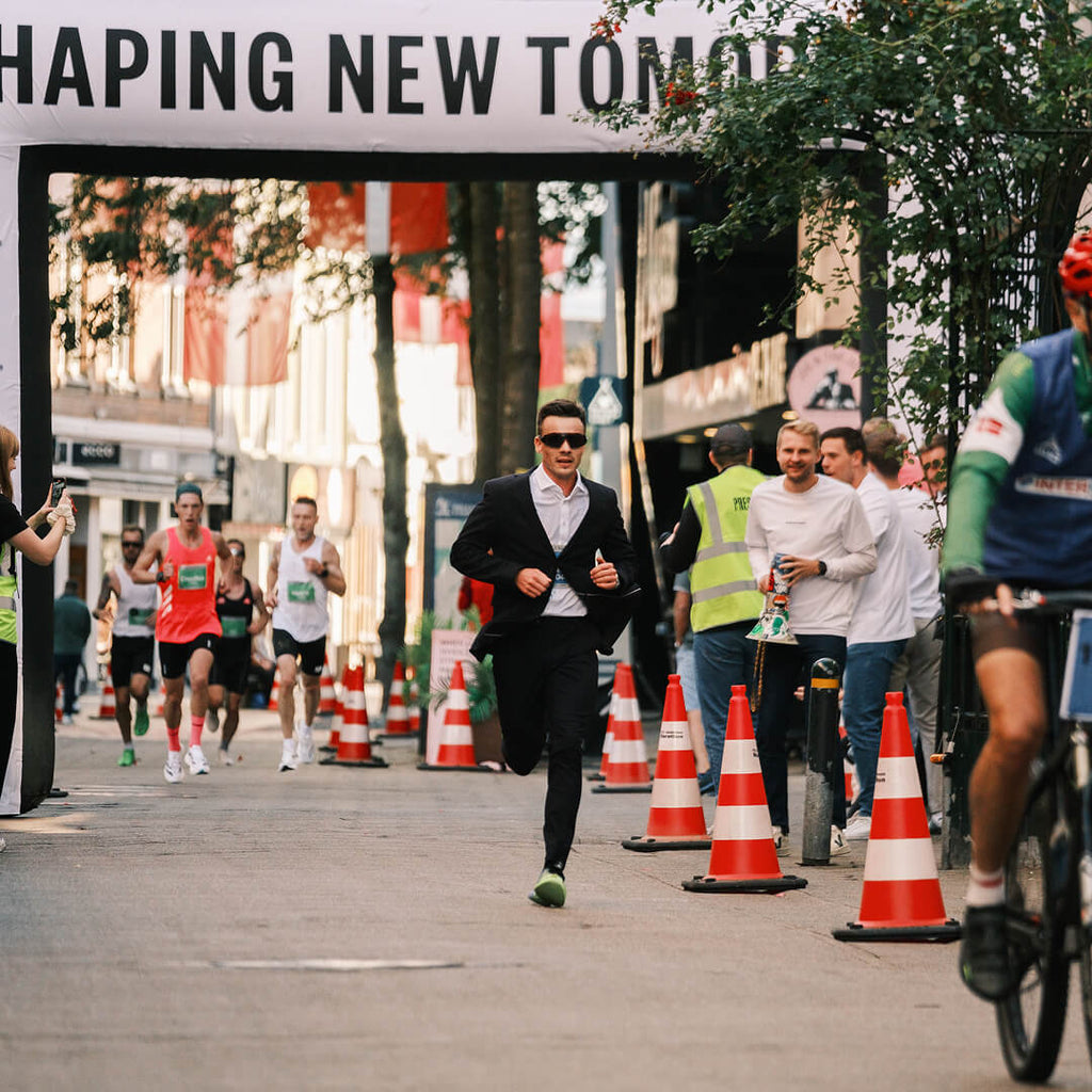 Running the fastest marathon in a suit (and winning it)