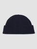 Wool Beanie Navy in navy blue merino wool with a ribbed knit, cuffed brim, and Scandinavian design.