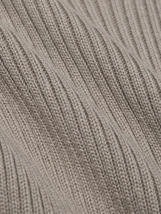 Close-up view of folded Women’s Fine Knit Rib Vest Dark Sand fabric.