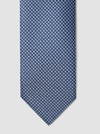 Tie Structure Shadow Black necktie featuring a repeating houndstooth pattern.