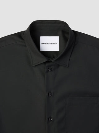Black long-sleeved button-down Siena Shirt Black with a Shaping New Tomorrow brand label inside the collar, featuring a minimalist Scandinavian design.