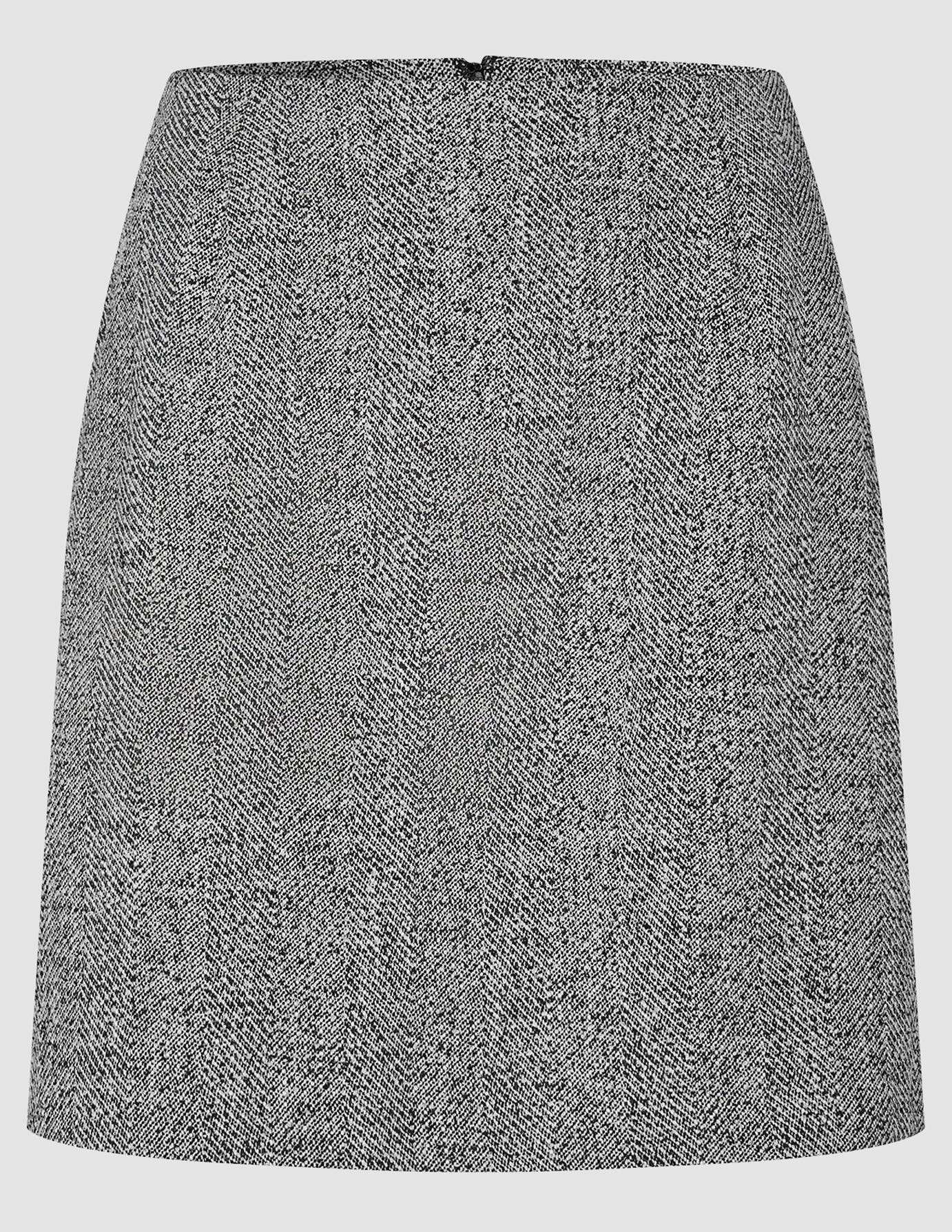 An Ashryn Set Domino Herringbone Blazer and Short Skirt in a Scandinavian design.