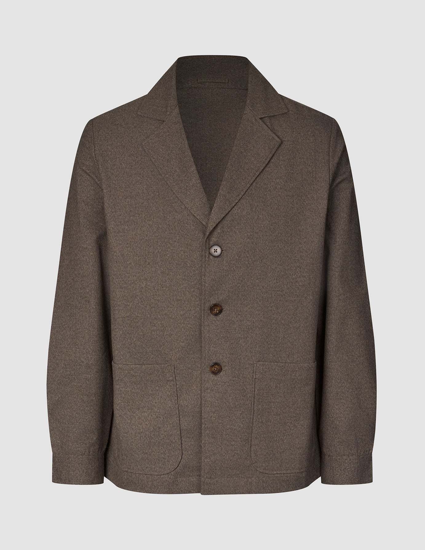 Atelier Overshirt Dark Beige: a heavyweight twill blazer with a collar, three front buttons, and two lower patch pockets.