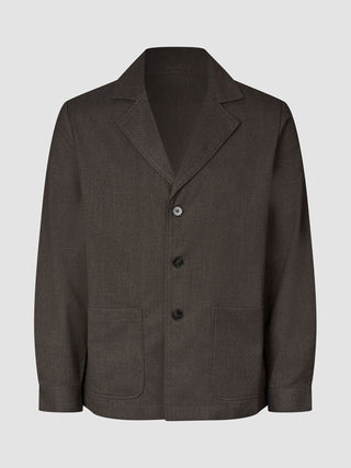 Atelier Overshirt in dark brown, a button-front blazer in heavyweight textured fabric featuring a notched lapel and two front patch pockets.