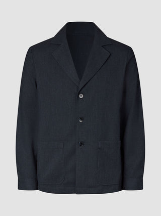 Atelier Overshirt in dark navy featuring a notched collar, two front patch pockets, and a heavyweight textured finish.
