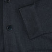 Atelier Overshirt Dark Navy in a heavyweight textured fabric, featuring dark buttons, a sleeve cuff, and a clean Scandinavian design.