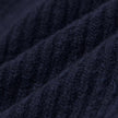 Close-up of a navy blue rib knit Wool Beanie Navy.