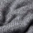 Close-up of a grey Chunky Soft Wool Knit Crewneck Glacier Grey sweater.