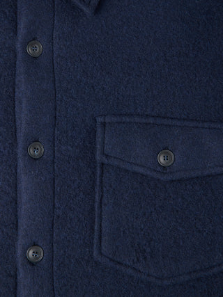 Close-up of a Double Layer Wool Overshirt Regular Dark Navy in a wool blend, featuring a center button placket and a single chest pocket with a buttoned flap.