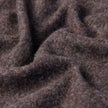 Close-up of the Double Layer Wool Overshirt Saddle Brown featuring brown textured fabric with soft folds.