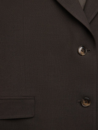 Close-up of a Women Ease Blazer Mocha Melange featuring two front buttons and a pocket.