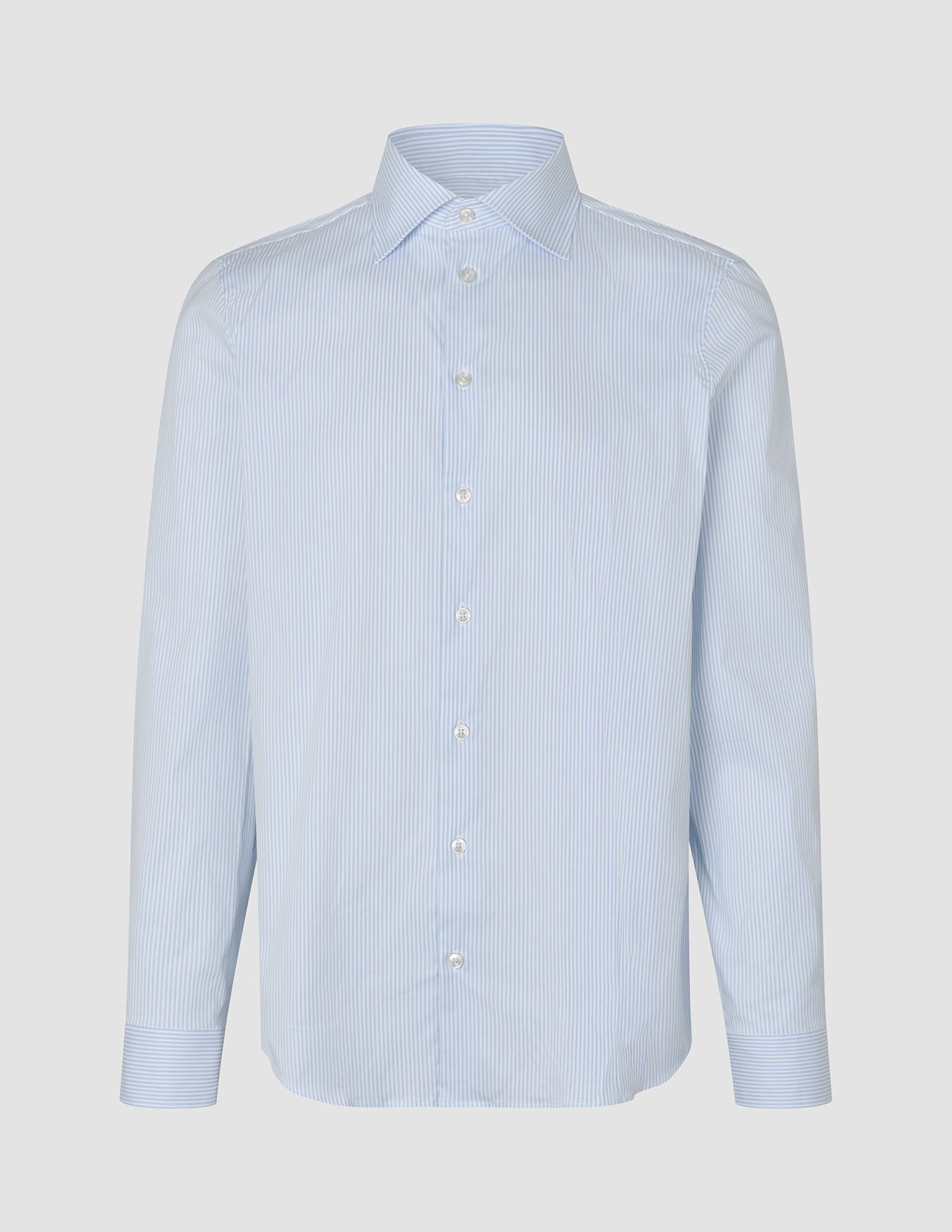 Elevated Shirt Regular Classic Blue Striped featuring an elegant long-sleeved button-down design with a light blue and white vertical stripe pattern, a standard collar, and refined Scandinavian styling.