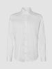 Elevated Shirt White Slim, a slim fit white long-sleeved dress shirt in Pima cotton, featuring a spread collar and a button-down front.