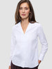 Woman wearing a white long-sleeved Madison Shirt White in 100% cotton with a notched collar.