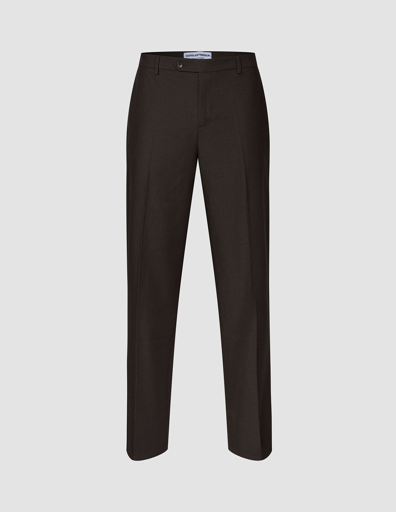 Motion Suit Pants Relaxed Cognac in dark brown with a relaxed fit, button closure, and front creases.
