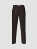 Motion Suit Pants Relaxed Cognac in dark brown with a relaxed fit, button closure, and front creases.