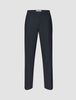 Motion Suit Pants Relaxed Midnight Blue in a relaxed fit with a straight leg and a center crease.