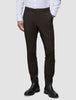 Slim-fit 360° stretch Motion Suit Pants Slim Cognac paired with a white button-down shirt and black boots.