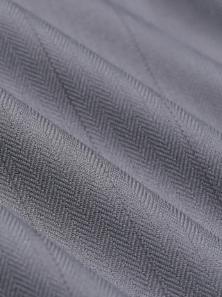 Close-up of the grey herringbone fabric with thin pinstripes used for Women Raina Pants Wide Mid Grey Pinstripe.