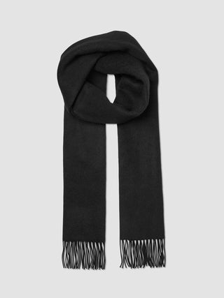 Scarf Black, a black wool scarf with fringed ends, shown looped.
