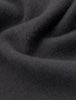 Close-up of a Scarf Charcoal Grey in soft, deep folds of cashmere.