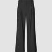 Serene Pants Wide Black in a clean Scandinavian design featuring a high waist, wide legs, front pleats, a button closure, and a zip fly.