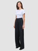 A woman wearing a plain white t-shirt and Serene Pants Wide Black.