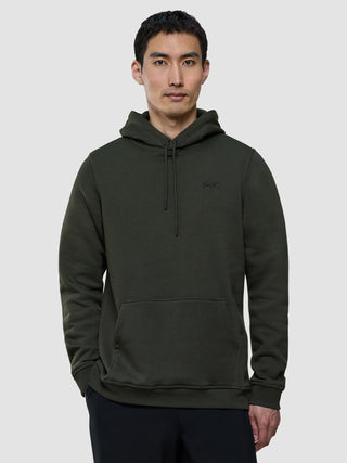 A man wearing a Sweat Hoodie Green Night.