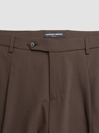 Close-up of the waistband and fly of Tech Wool Suit Pants Regular Cocoa Brown with a Shaping New Tomorrow Denmark brand label.