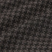 Close-up of the Timeless Wool Blazer Slim Dark Brown Check, featuring a dark brown slim fit wool blazer with a subtle checkered weave.