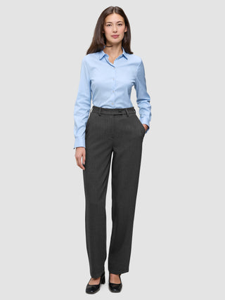 A woman wearing a light blue button-down shirt and Women GO2 Pants Straight Dark Grey Melange.