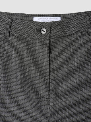 Close-up of the button closure and waistband of the black and white Women Nara Pants Wide Black Check.