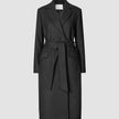 Women’s Wool Coat Black in a double-breasted Scandinavian design featuring a notched lapel and a matching tie belt.