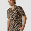 Model from the front wearing a Classic Short-Sleeved Shirt Dark Paisley with a bowling collar