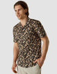 Model from the front wearing a Classic Short-Sleeved Shirt Dark Paisley with a bowling collar