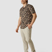 Model in full body wearing a Classic Short-Sleeved Shirt Dark Paisley with a bowling collar