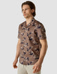 Model from the front wearing a Classic Short-Sleeved Shirt Subtle Flowers