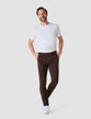 Model in full body wearing a pair of Classic Pants in Espresso/Dark Brown