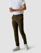 Model from the front wearing a pair of Classic Pants North/Dark Green with a white t-shirt and white sneakers 