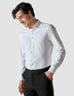 Model from the front wearing a Classic Shirt White with black pants