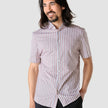 Model from the front wearing a Classic Short-Sleeved Twill Shirt Mahogany Stripes the shirt is White a subtle twill pattern and light bordeaux stripes 