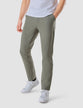 Model from the front wearing a pair of Essential Pants Limestone/Light Green