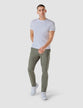 Model in full body wearing a pair of Essential Pants Limestone/Light Green