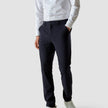 Model from the front wearing a pair of Essential Pants Midnight Blue