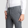 Model in full body wearing a pair of Essential Suit Pants Dark Grey
