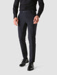 Model from the front wearing a pair of Essential Suit Pants in Stanford Stripes/Dark navy stripes 