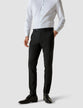 Model from the front wearing a pair of Essential Suit Pants Black