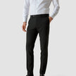 Model from the front wearing a pair of Essential Suit Pants Black