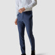 Model from the front wearing a pair of Essential Suit Pants Marine Blue 