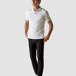 Model in full body weraing a Piquet Polo Shirt White